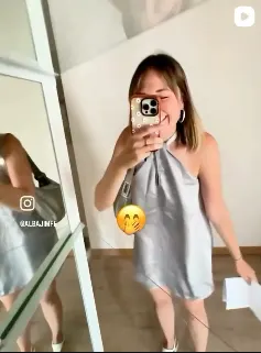 A customer taking a selfie in her new home